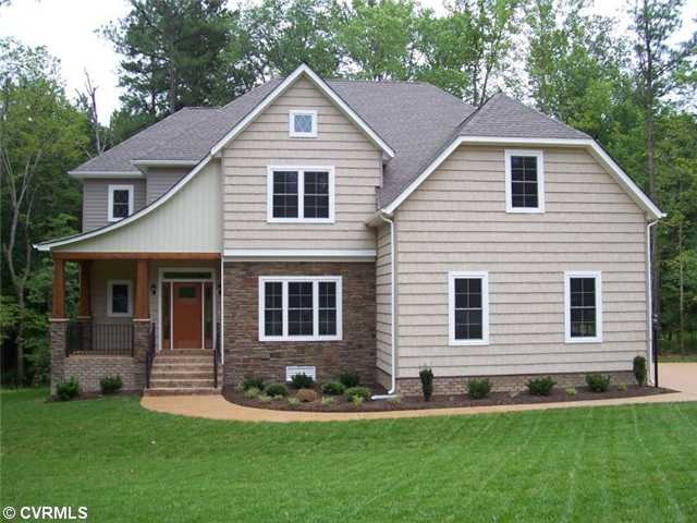 Exterior Front - Photo shown is similar to the hom