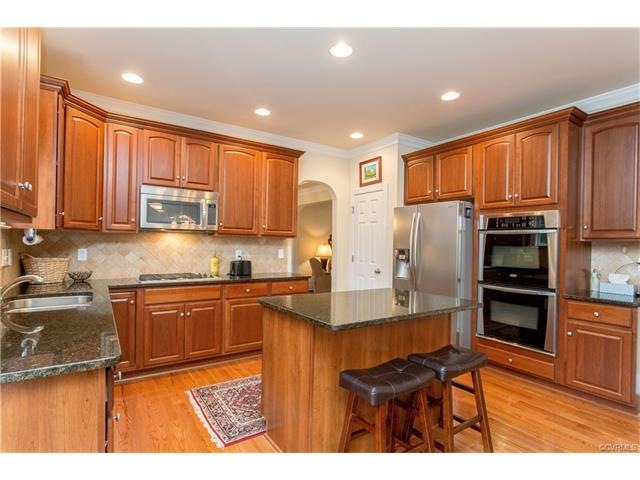 Wow!  Look at this amazing Kitchen, featuring stai