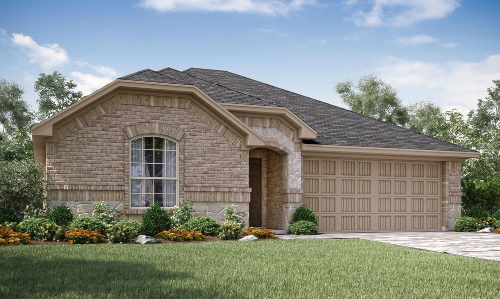 View of front of house featuring a garage and a fr