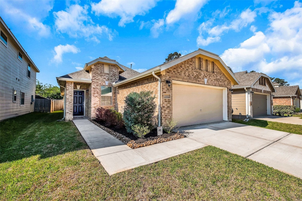 11102 Sun River Falls Dr, Humble, TX 77396 - photo 1