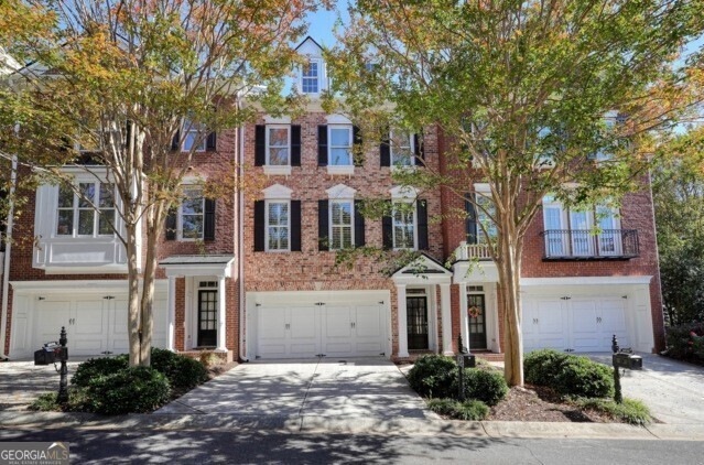 John Weiland brick townhome located tucked away fr