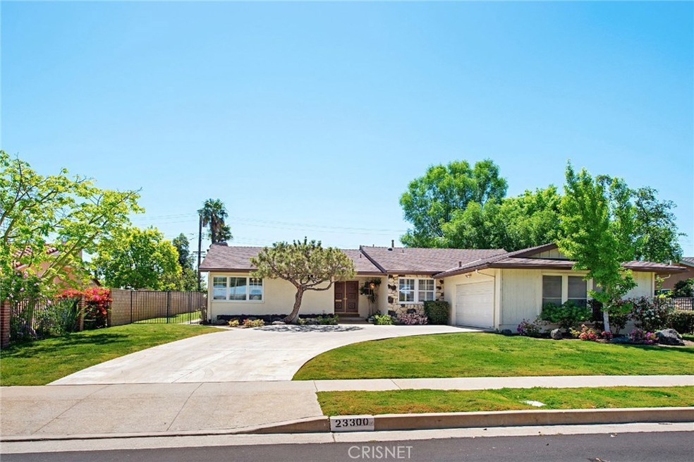 Expansive frontage on 11,025 s.f. lot highlighted by striking curb appeal