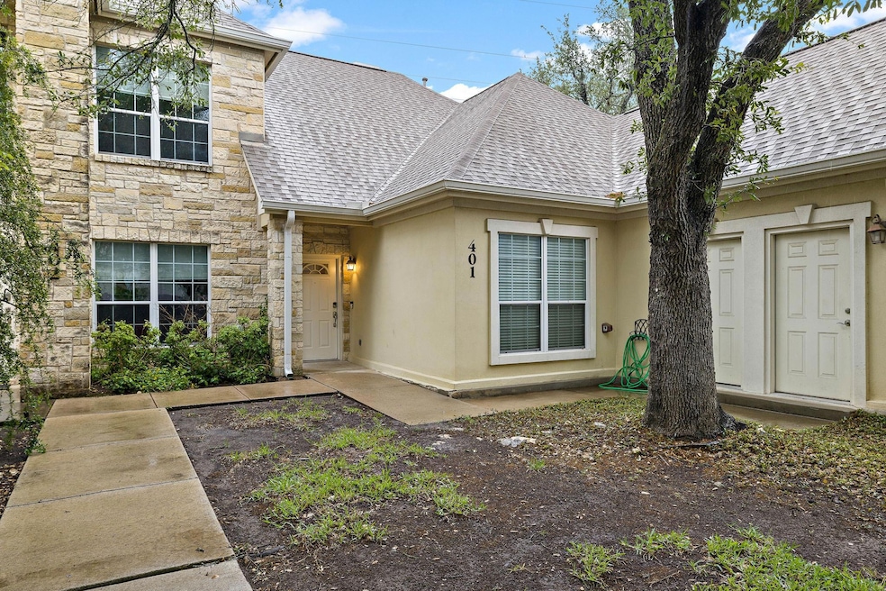 View of front of home with roof with shingles, st