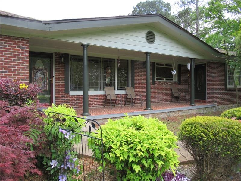 Front exterior of this four sides brick beauty wit