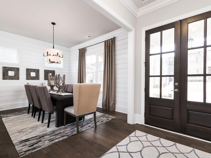 Beautiful Foyer open to the elegant dining room wi