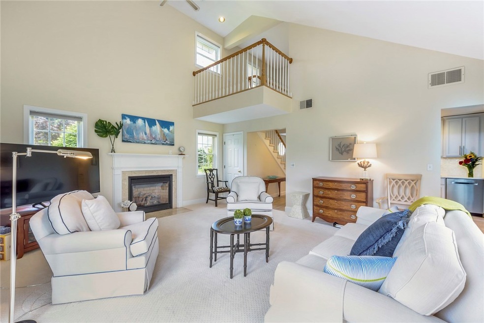 Great Room- balcony on second level, kitchen and d