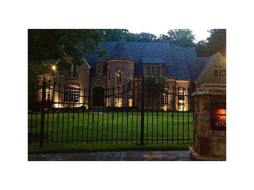 Exterior Front. Dusk at Regency Court. Stunning.