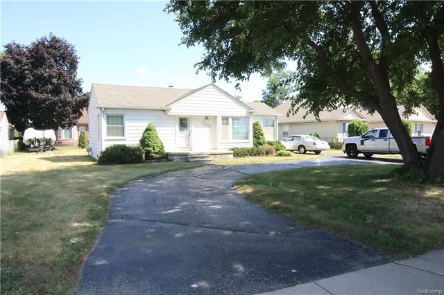 FRONT VIEW NOTE CIRCULAR DRIVE AND ROOM ON WEST SIDE OF HOME FOR RV PARKING