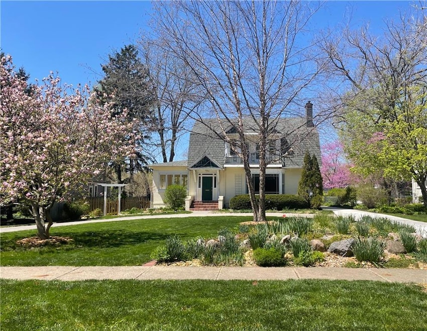 Exterior front with grand circular driveway.