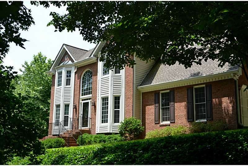 Exterior Front. Home sits back on the property, pr