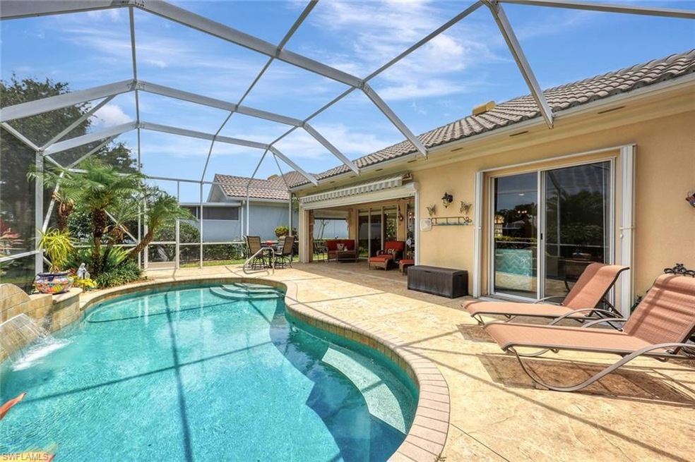 View of swimming pool featuring a lanai, a patio a