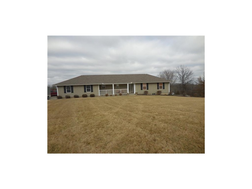 FRONT OF HOME WITH COVER FRONT PORCH NEW SIDING