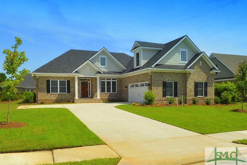 This gorgeous brick home is very open and bright a