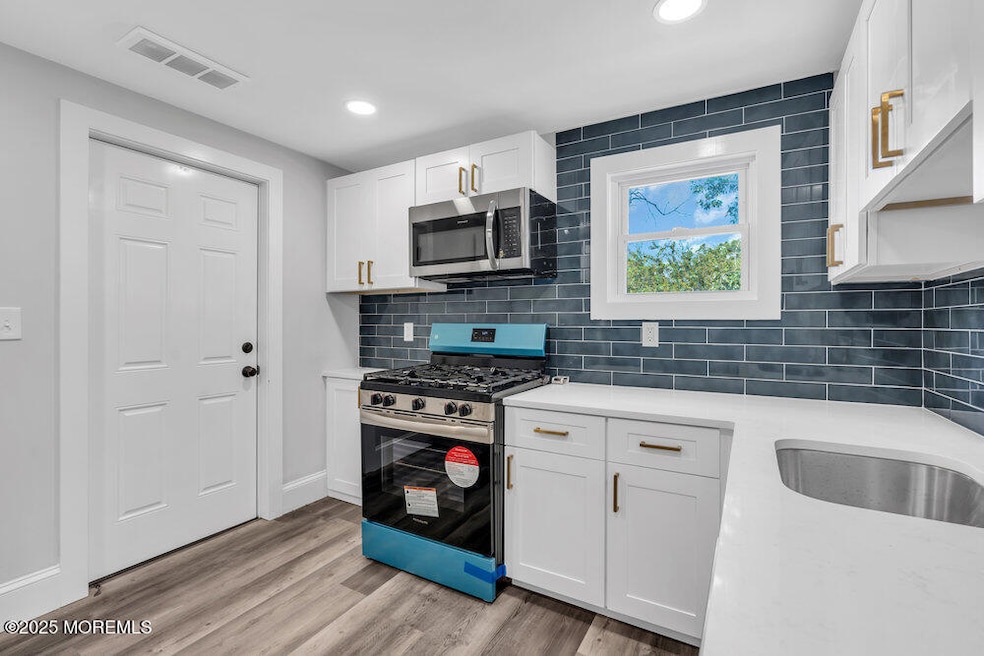 209 Atkins Ave unit 2nd Floor, Neptune, NJ 07753 - photo 1