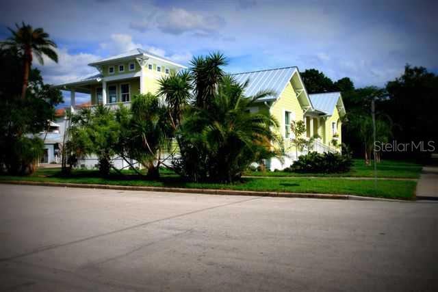 Exterior Front - Lovely Corner lot within a block of Davis Islands village.