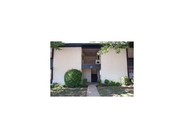 Exterior Front. Front is treed and faces south