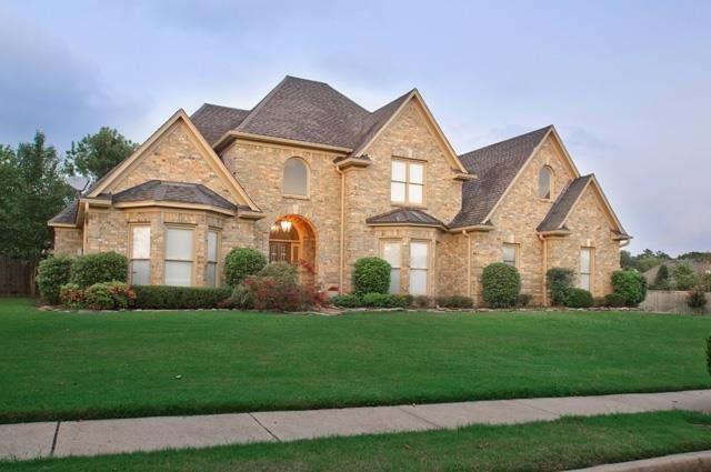 This Gorgeous 2-story brick home is a must see!