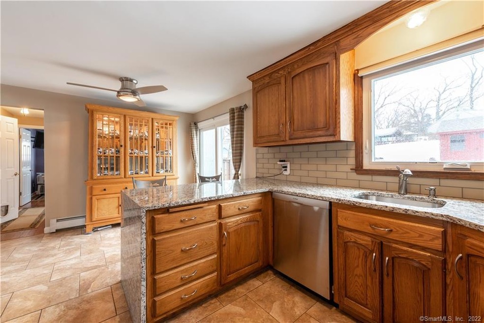Waterfall granite, glass back splash, and stainles