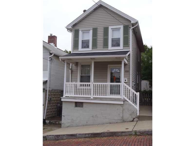 Exterior Front. The exterior is vinyl sided and ha