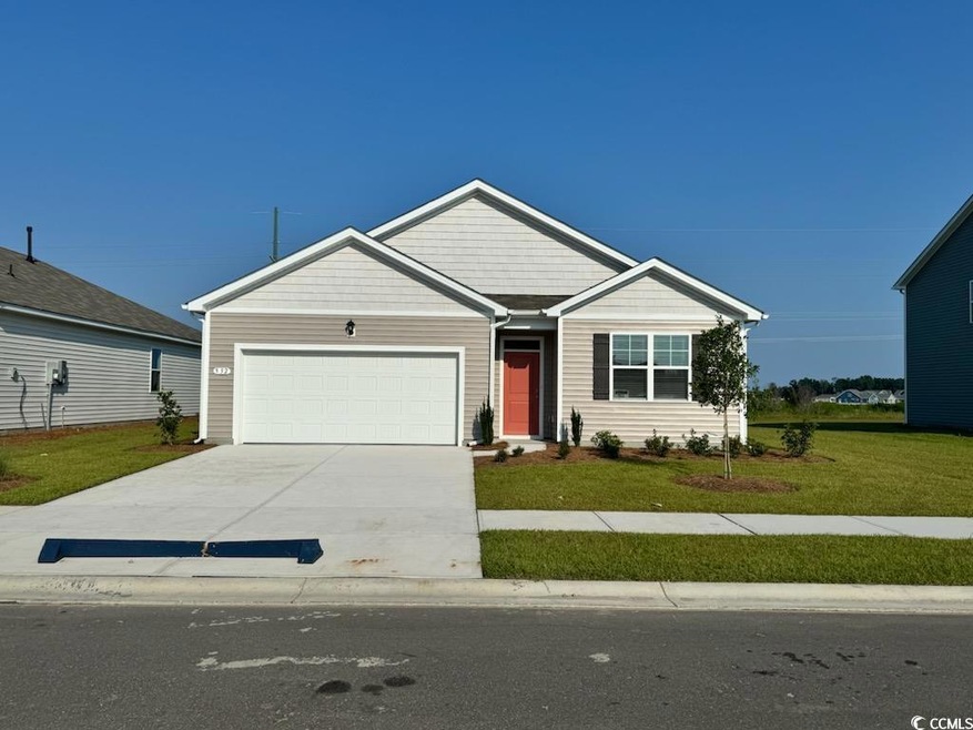 View of front of property with a garage and a fron
