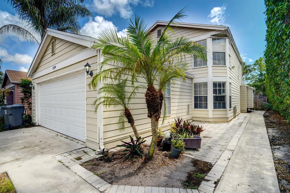 1324 Strawberry Ln, West Palm Beach, FL 33415 - photo 1