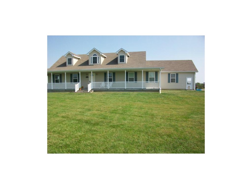 Front with west and north wrap around porch