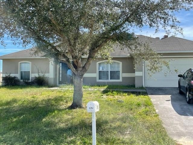 596 Hatchwood Dr, Haines City, FL 33844 - photo 1