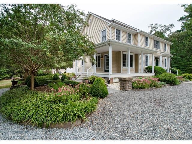 Front of house pulling into circular drive