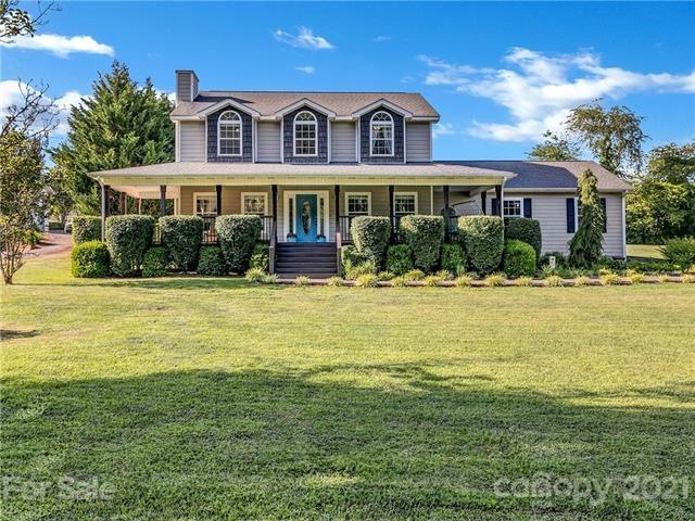 Enjoy the large wrap around porch on this southern