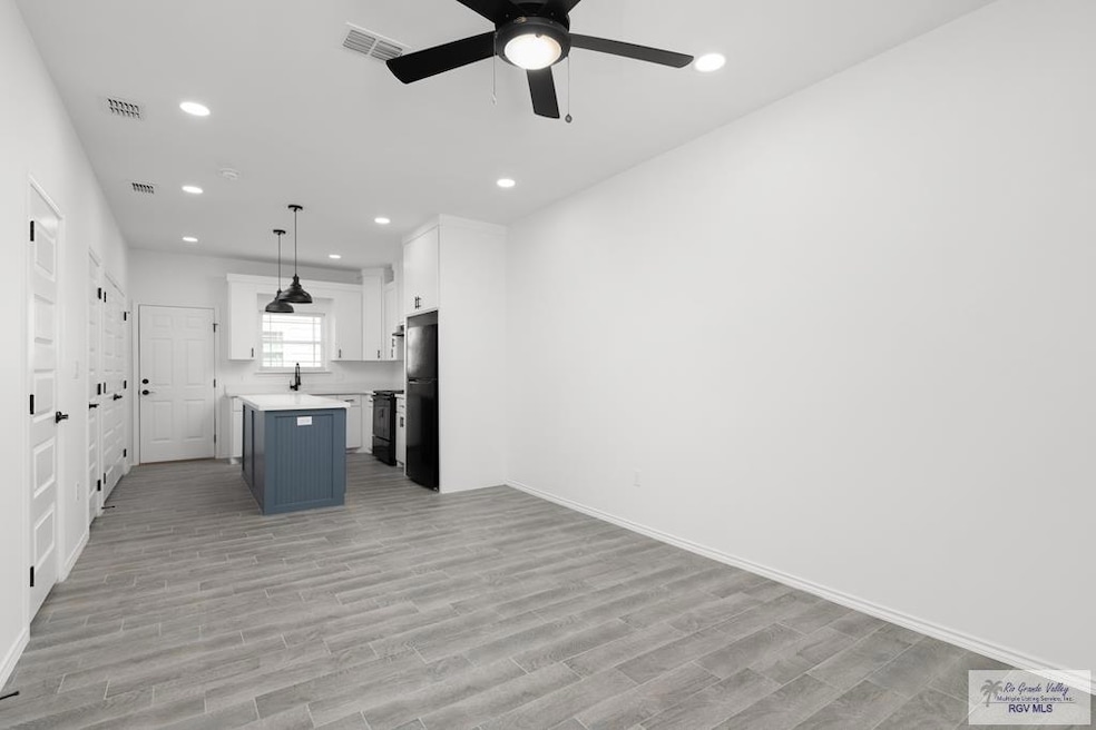 405 Lion's Villa Ave unit 14, La Feria, TX 78559 - photo 1