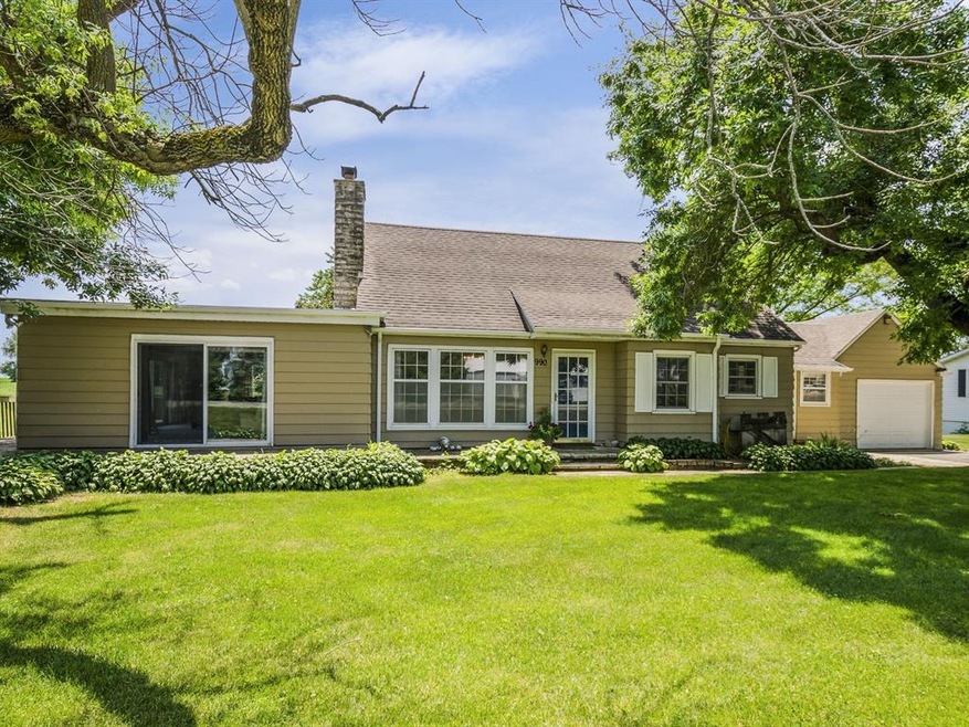 Beautiful home with mature trees in the front