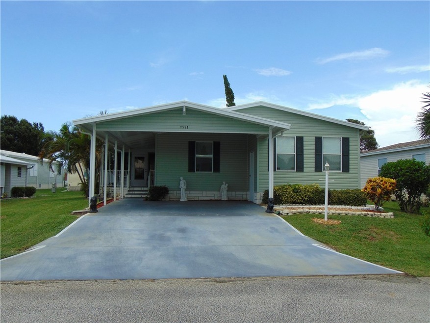 Front View Double carport/driveway with open patio