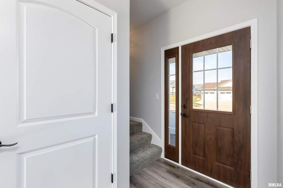 1207 W 63rd St, Davenport, IA 52806 - photo 1