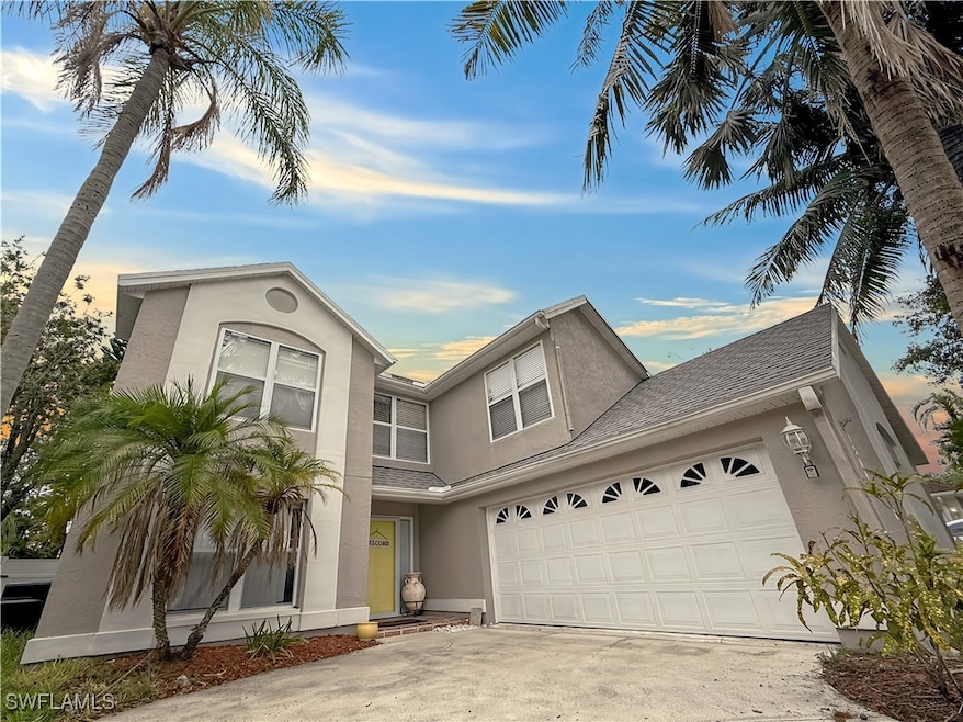 View of front of home featuring stucco siding, con