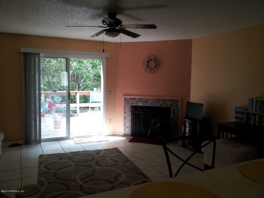 Family Room with Tiled Fireplace