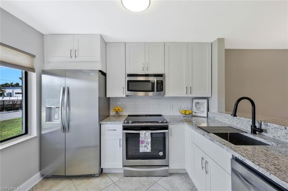 1211 Rosemary Ct unit 104, Naples, FL 34103 - photo 1