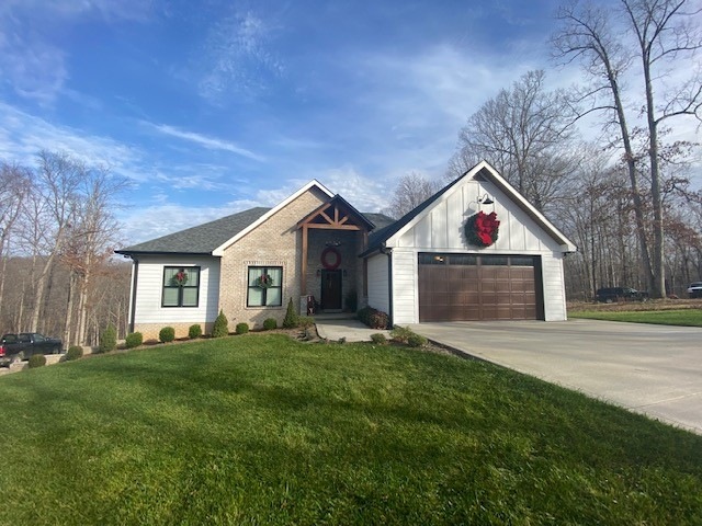 176 Oak Crest Dr, Tennessee Ridge, TN 37178 - photo 1