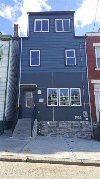 Fully redone front exterior with stacked stone and