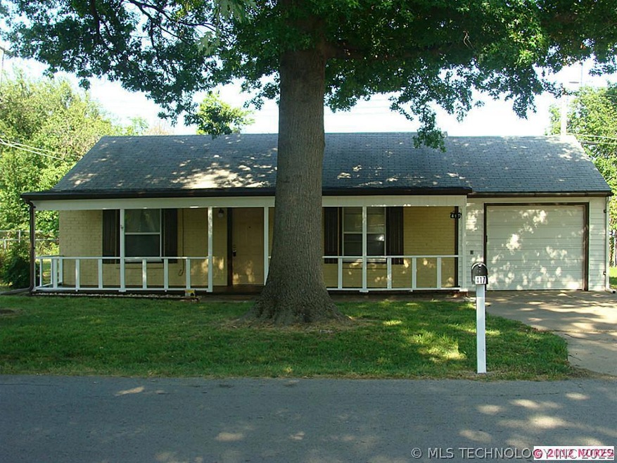 FRONT VIEW OF PROPERTY. FRESH PAINT,MATURE TREES.