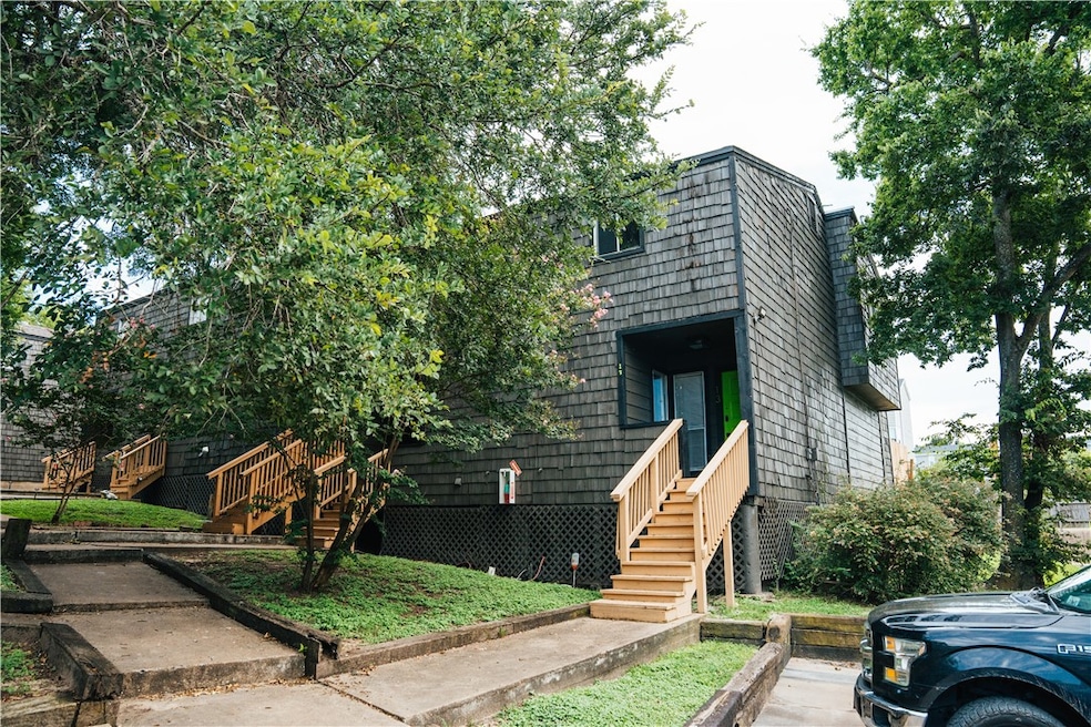 View of front of house featuring stairs