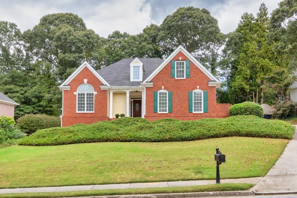View of front of property with a front lawn