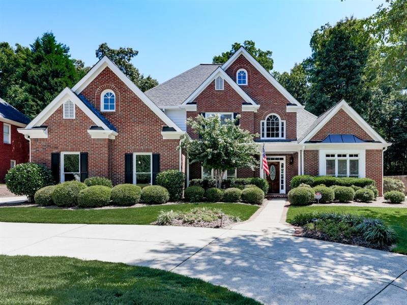 3 sided brick traditional with 3 car side-entry ki