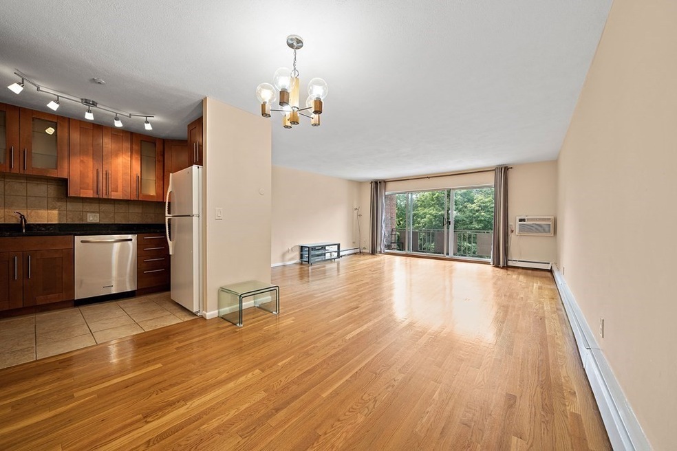 383 Langley Rd unit 11, Newton Center, MA 02459 - photo 1