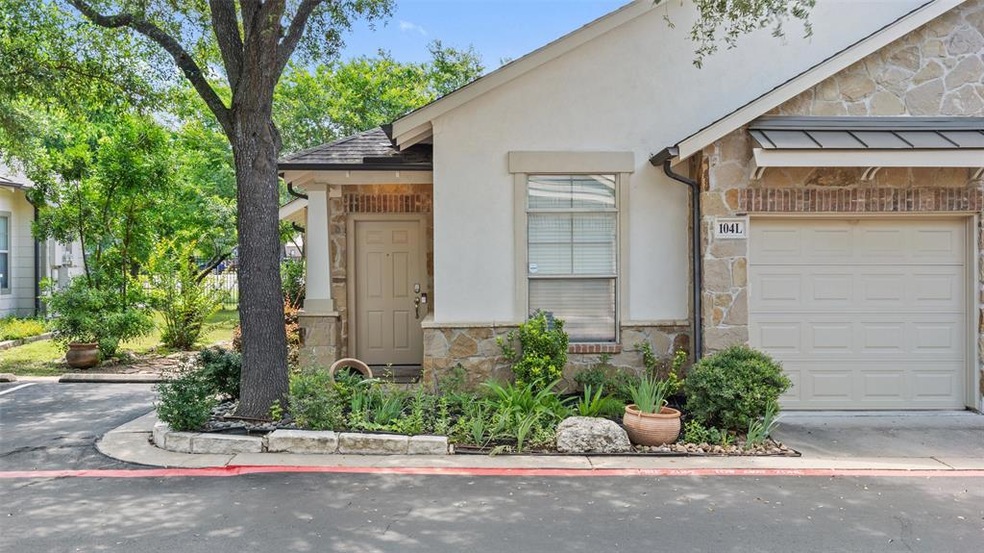 Three bedroom one level Condo with private garage 