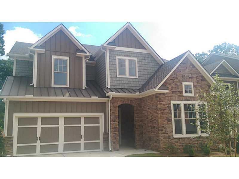 Exterior Front. Gorgeous stacked stone entry welco