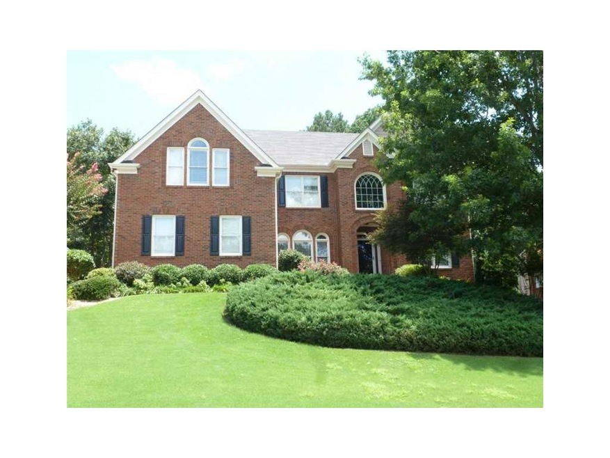 Exterior Front. To die for.  3 side brick beauty w