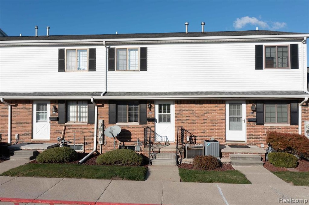 View of front of home with brick siding
