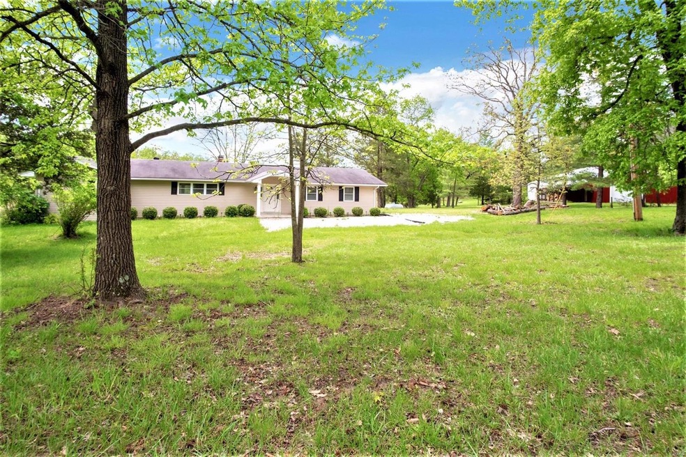 Main home on approx 24 park like private acres.