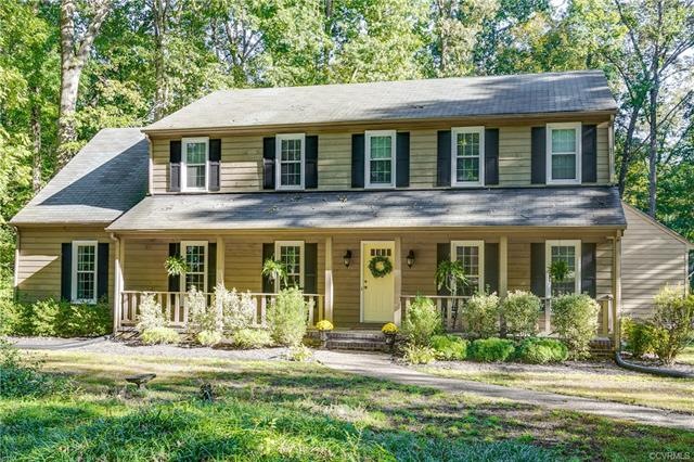 Welcome home to 13507 Queensmill Road in the beaut