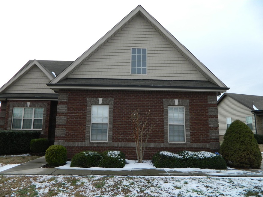 Front view of, custom brick work nicely landscaped 